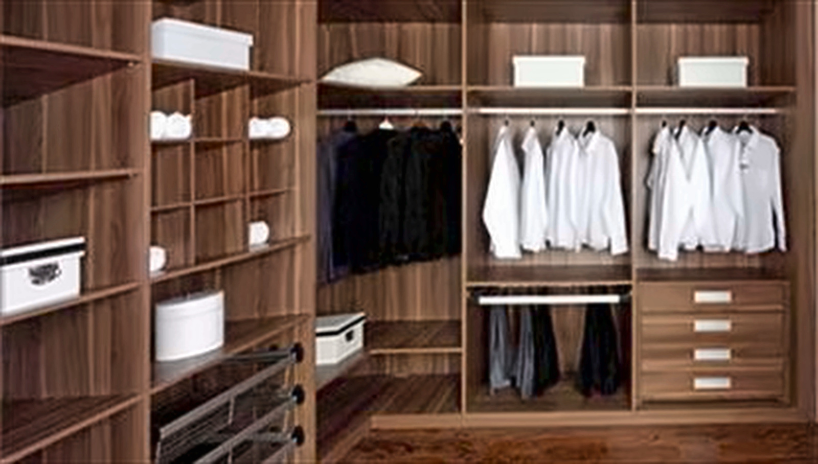Dark wood walk-in closet with storage arranged along two adjoining walls.
