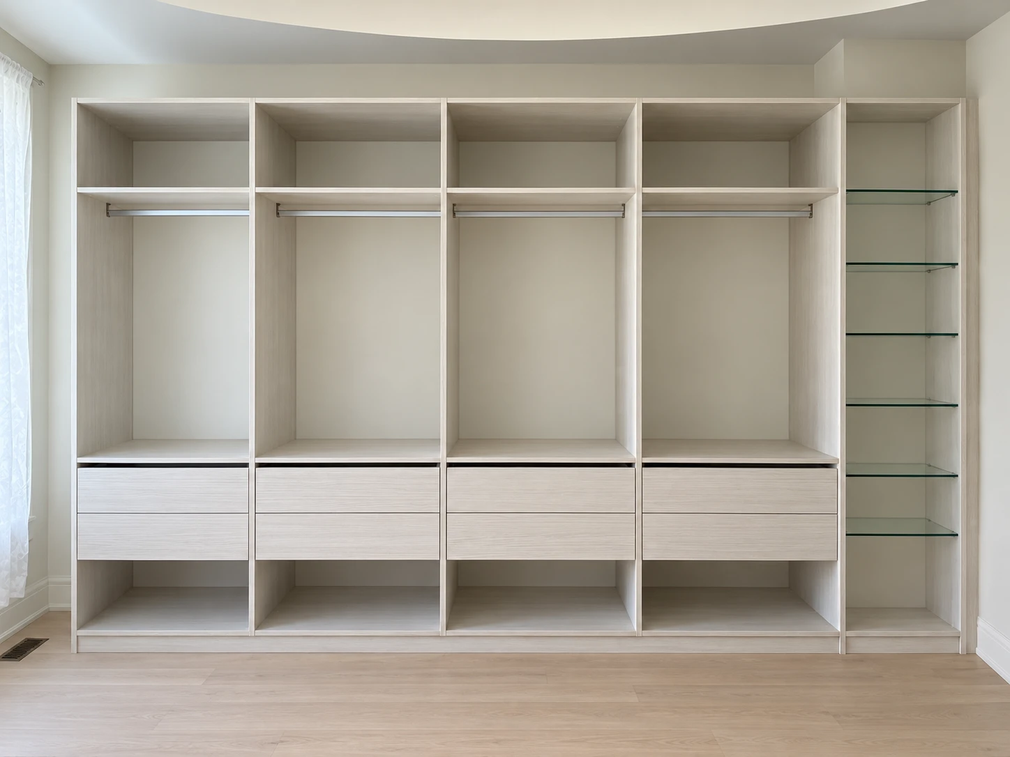 Open-concept wardrobe with glass shelves and integrated drawers