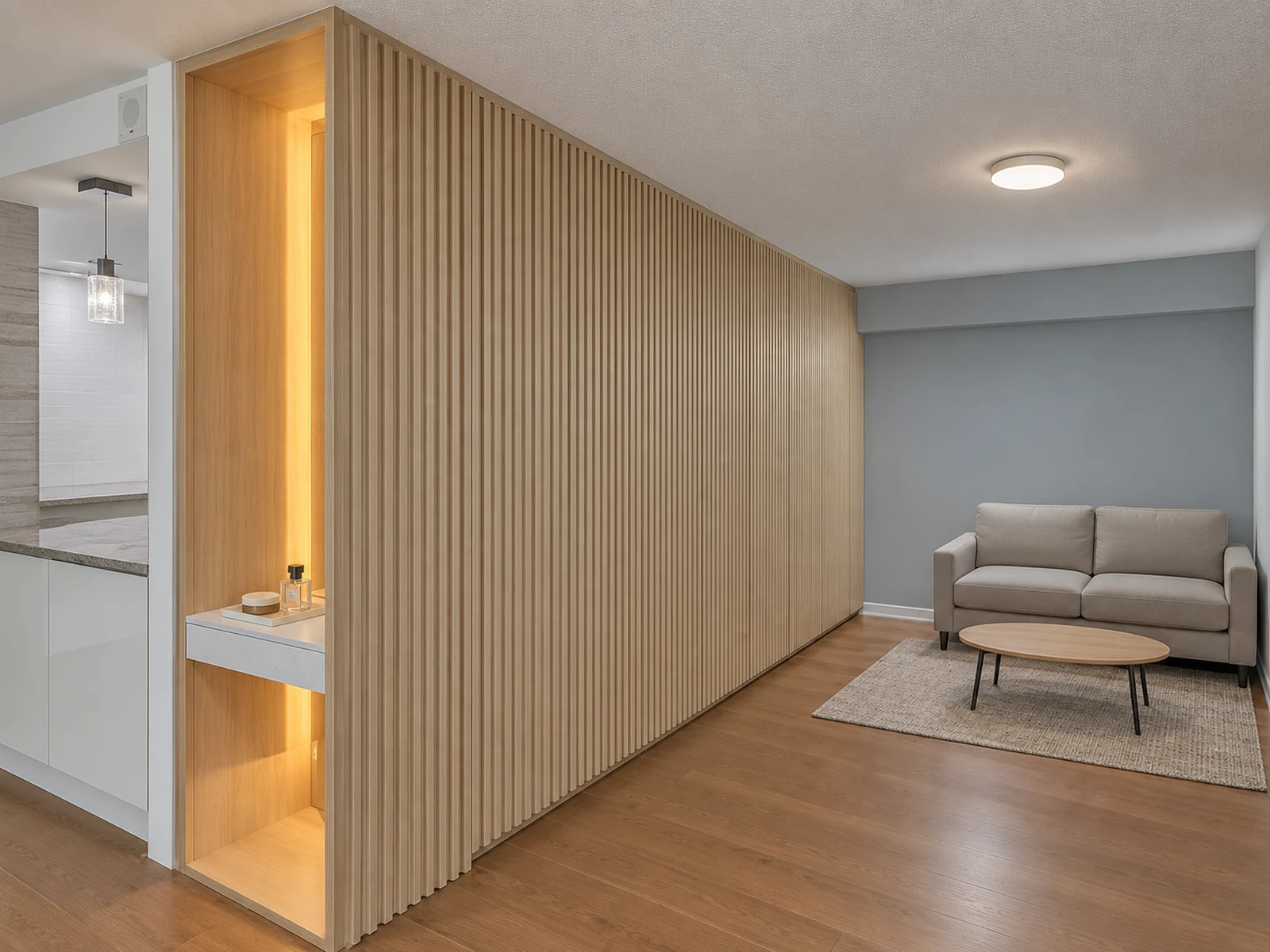 Fluted push-to-open wardrobe wall with recessed LED-lit makeup table