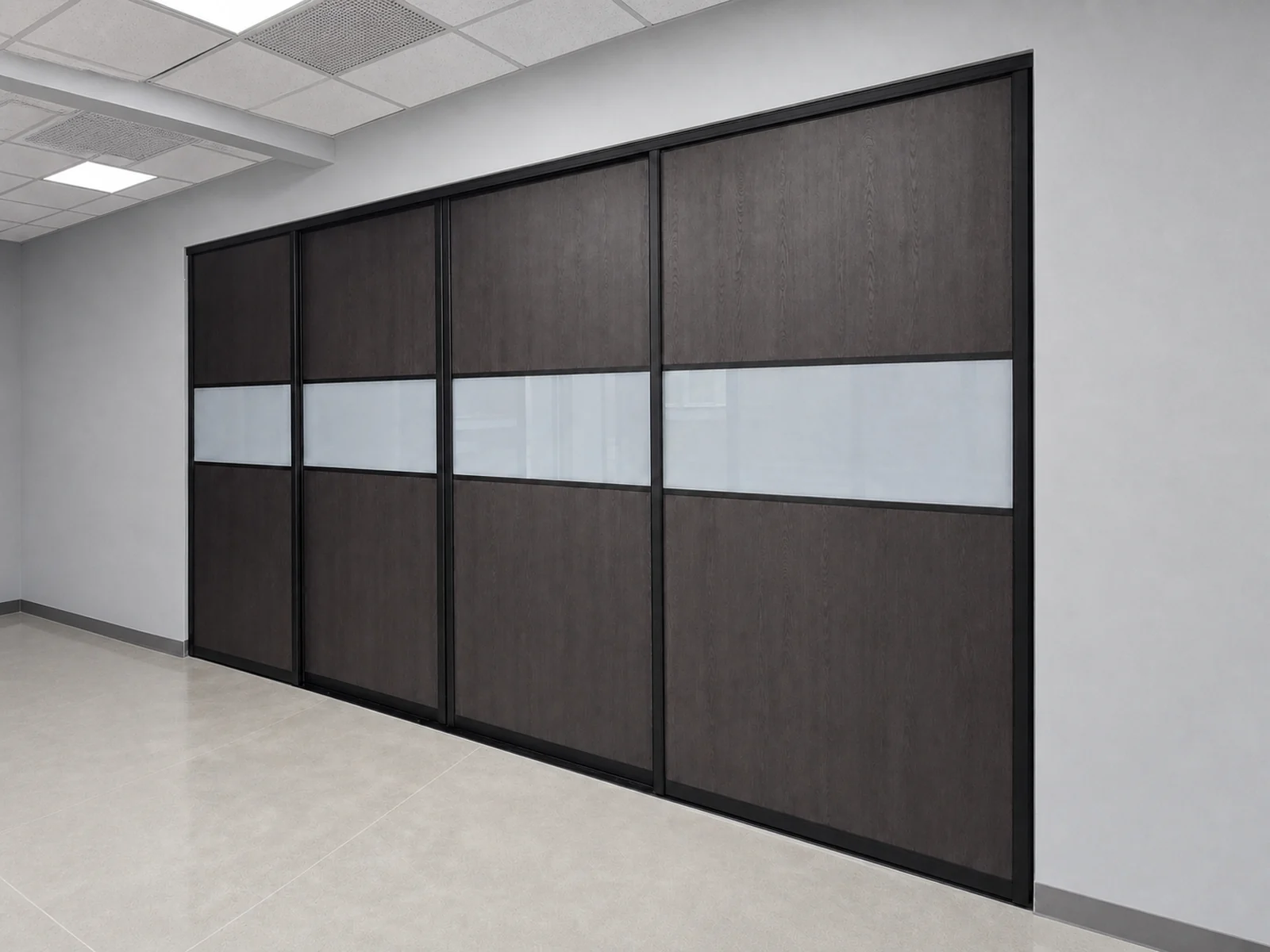 Four extra-wide black-framed sliding doors with dark wood and frosted laminated glass panels.