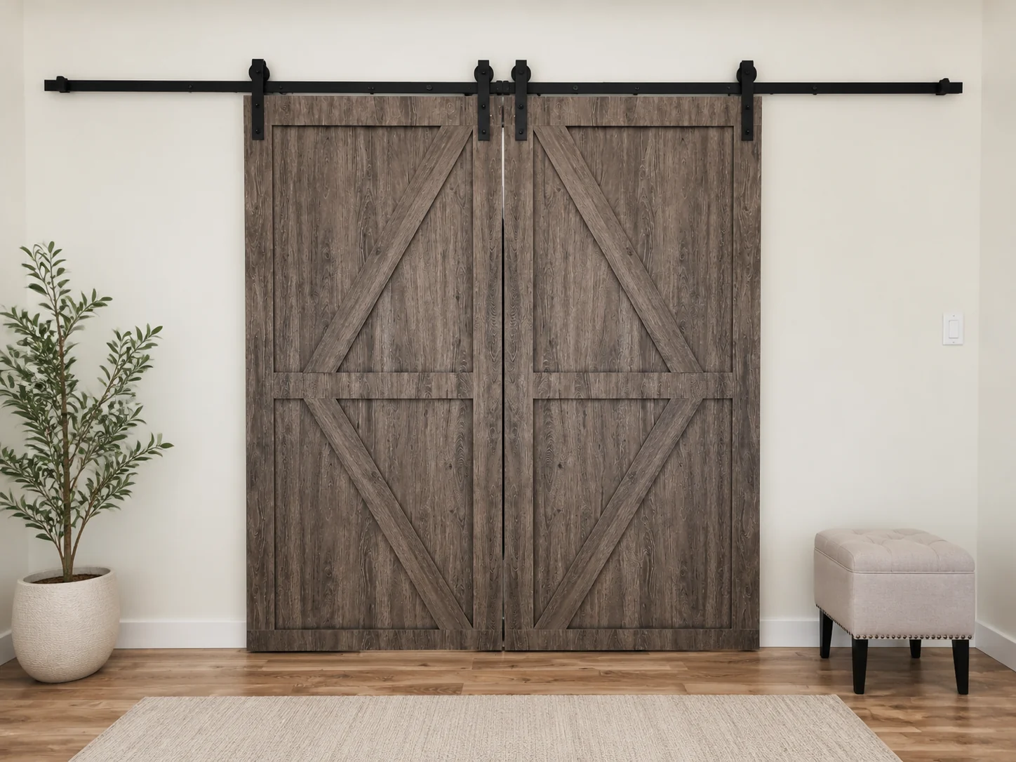 Matching dark wood barn-style sliding doors with layered panels, diagonal trim, and an exposed black rail.