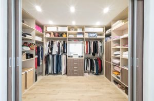 Big Wardrobe With Different Clothes For Dressing Room Big wardrobe with different clothes for dressing room