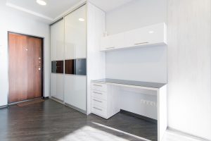 The Photo Of The Hall Of The Room With An Entrance And A Mirror The photo of the hall of the room with an entrance and a mirror case