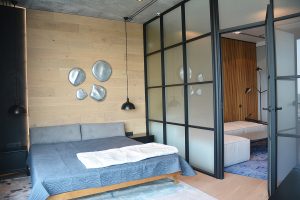 Modern Bedroom After Remodeling And Renovating With Contemporery Modern bedroom after remodeling and renovating with contemporery glass wall and loft interior design.